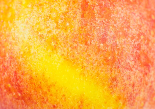 Feche a foto do fundo da maçã vermelha Maçãs textura de casca de frutas macro vista lindo papel de parede natural