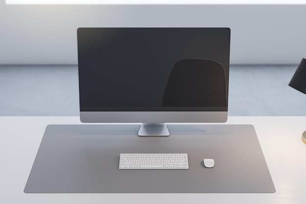 Feche a mesa do escritório com monitor de computador vazio e lâmpada de reflexão e teclado em fundo desfocado Renderização 3D