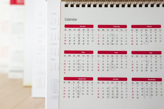 Feche as datas da página do calendário e o plano de fundo do mês, planejamento de negócios, compromisso, reunião, conceito