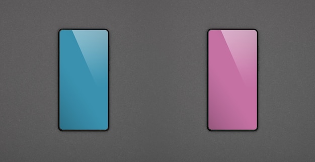 Foto feche dois smartphones com telas em branco, azul e rosa, sobre fundo de papel cinza, camada plana, diretamente acima