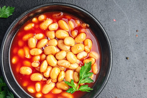 feijão molho de tomate leguminosa branca comida saudável refeição dieta lanche na mesa cópia espaço comida