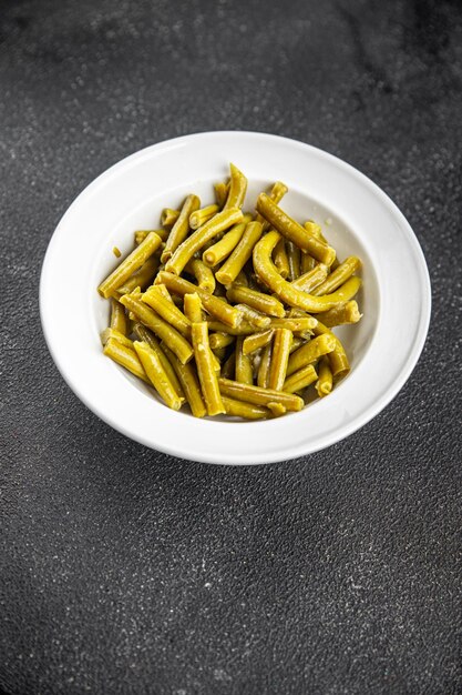 Feijão verde comida pronta para comer prato de comida saborosa fresca deliciosa comida gourmet fundo na mesa rústica vista superior espaço de cópia vista superior dieta ceto e paleo comida megetarian e vegana