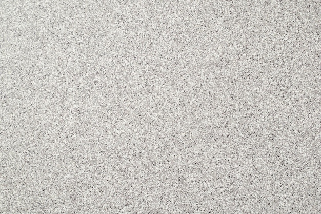 Feine Textur der weißgrauen Steinoberfläche