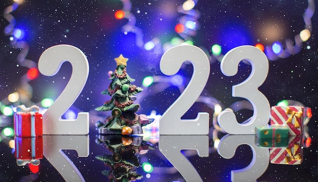 Feliz ano novo 2023 fundo cartão de férias de ano novo com luzes brilhantes