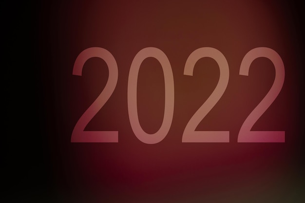 Feliz año nuevo 2022 escrito sobre fondo aislado