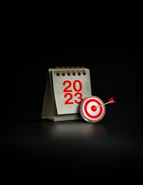 Feliz año nuevo 2023 fondo 3d icono de destino con rojo 2023 año numer escritorio calendario cubierta color beige de pie sobre fondo oscuro estilo vertical Objetivos comerciales y conceptos de éxito