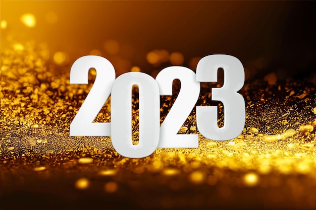 Feliz año nuevo 2023 sobre fondo de partículas de oro