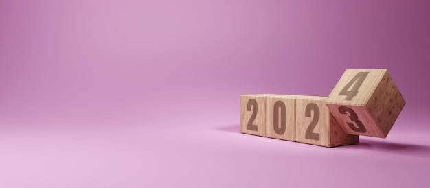 Feliz año nuevo 2024 concepto Bloques de madera con número 2024 sobre fondo rosa con espacio de copia