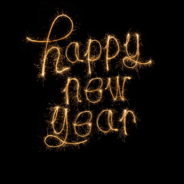 Feliz año nuevo escrito con fuegos artificiales Sparkle