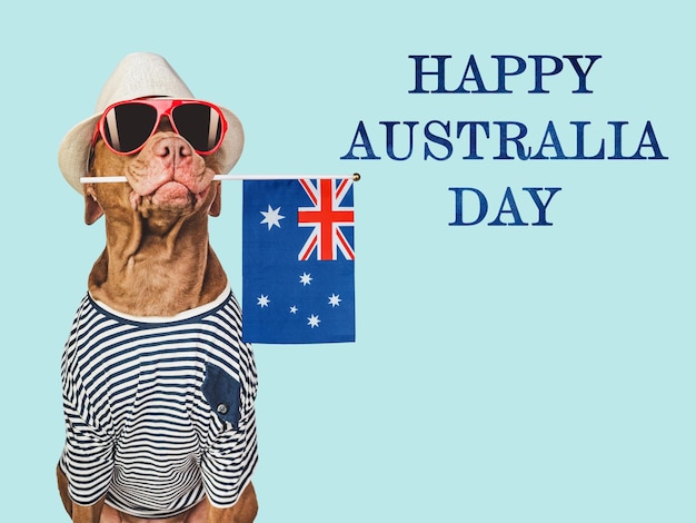 Feliz Dia da Austrália Cão bonito e bandeira australiana