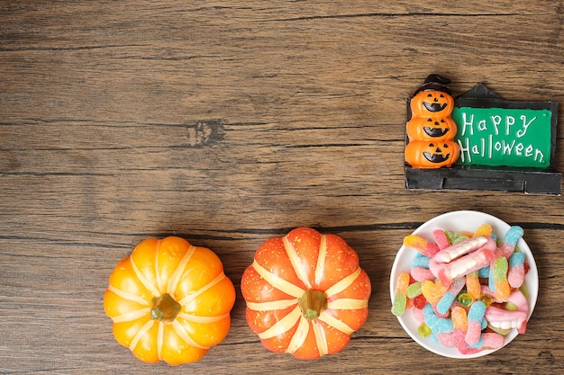 Feliz día de Halloween con cuenco de calabaza de caramelos fantasma y Trick or Threat decorativo Hola Octubre otoño otoño Fiesta festiva y concepto de vacaciones