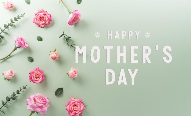 Feliz Día de la Madre y el concepto de decoración del Día de la Mujer hecho de flores y el texto sobre fondo pastel