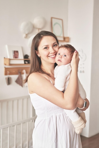 Feliz día de la madre Paternidad e infancia Madre y bebé en guardería