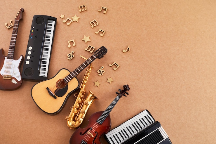 Foto feliz día mundial de la música instrumentos musicales sobre fondo marrón