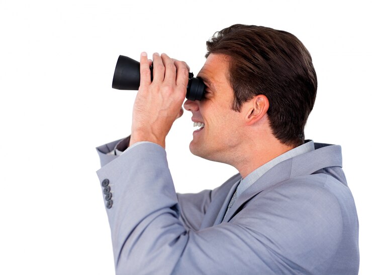 Foto feliz hombre de negocios con binoculares
