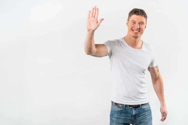 Foto feliz, homem jovem, mostrando, dela, mãos, contra, fundo branco