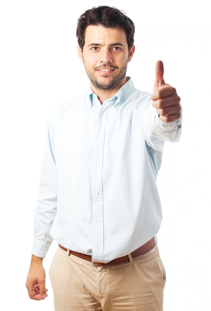 Feliz, homem jovem, polegares cima, sinal, ligado, um, fundo branco