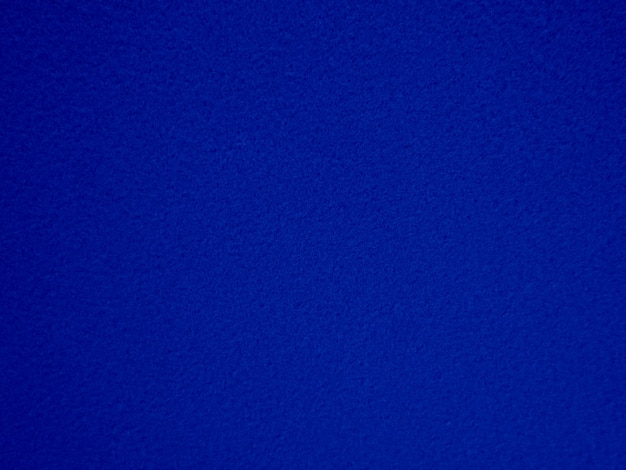 Felt azul suave material têxtil áspero textura de fundo perto de poker tablettennis balltable pano vazio tecido azul marinho denim fundo