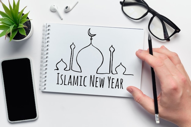 Feriado islâmico ano novo desenhado em um caderno.