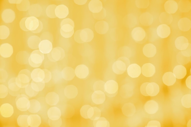 Feriados, festa e conceito de celebração - fundo dourado desfocado com luzes bokeh