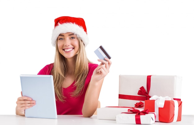 Festive blonde shopping online com tablet