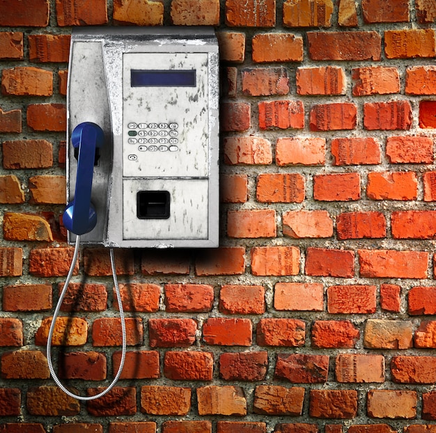 Öffentliches Telefon an der Wand