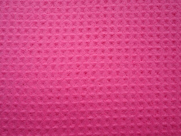 Fibras de esponja padrão de textura de esponja superfície fechada fundo magenta rosa
