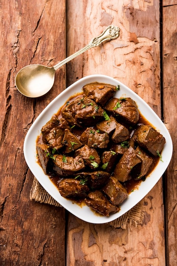 Fígado de carneiro frito ou kaleji masala, receita não vegetariana popular  da índia e do paquistão