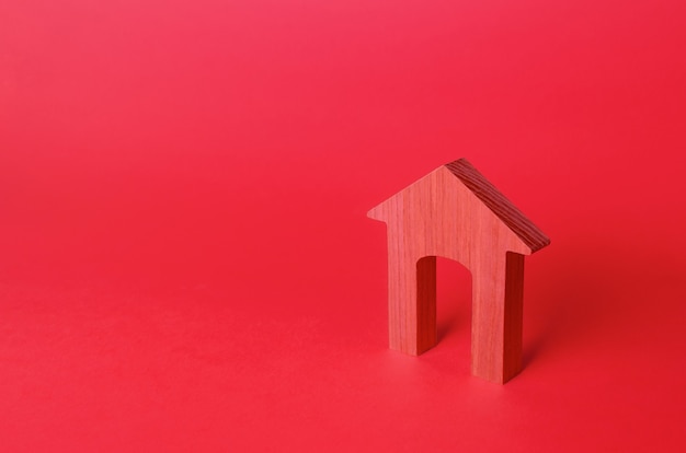 Figura de casa de arco rojo Vivienda asequible Alquiler de bienes raíces Reparación y renovación modernización Minimalismo Fondo rojo de inicio de sesión