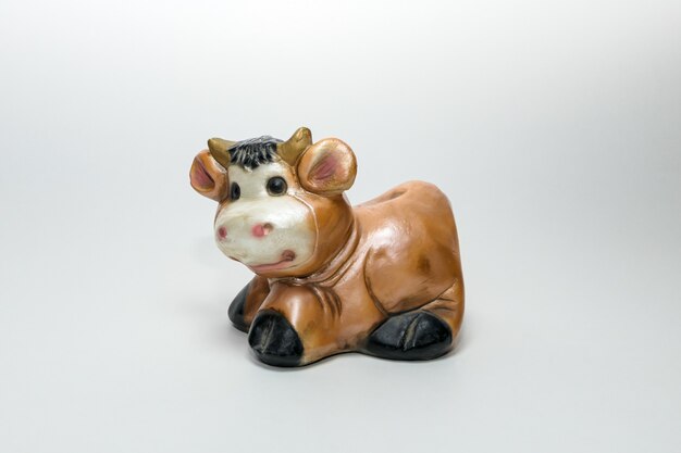 figura de gesso de uma vaca