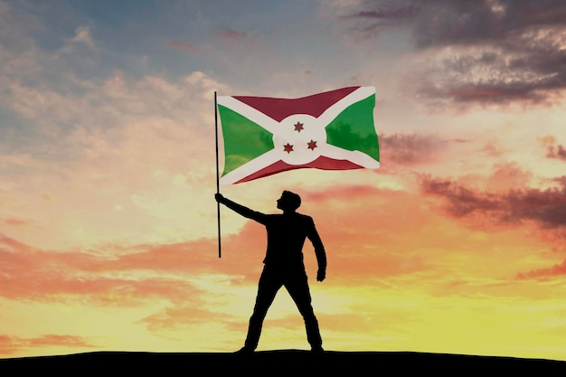 Figura masculina da silhueta acenando a rendição 3D da bandeira de Burundi