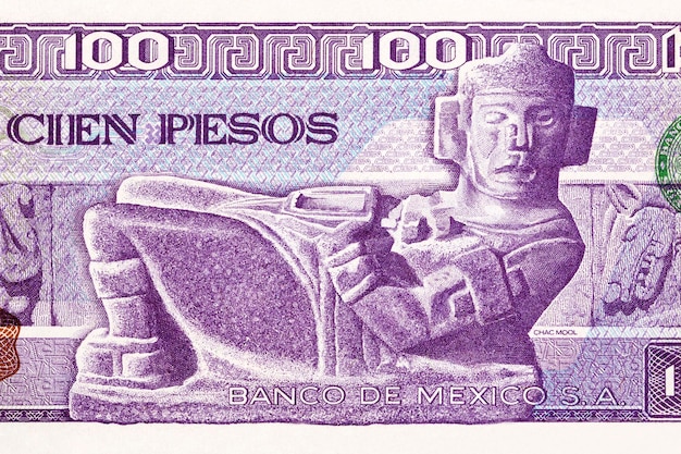 Foto figurilla de piedra chac mool del antiguo dinero mexicano - pesos