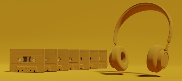 Fila de casetes de audio de cinta amarilla y auriculares sobre fondo de color amarillo Concepto de música de audio analógico