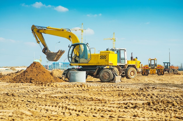 Fila de mashines de construcción