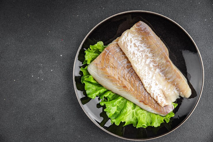 Foto filé de peixe branco frutos do mar crus frescos prato de comida deliciosa comida gourmet fundo na mesa comida rústica vista superior espaço de cópia dieta pescetariana