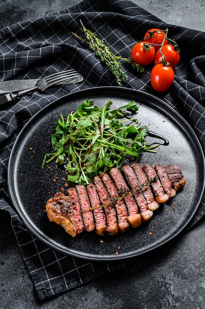 Filet Entrecote Steak, Marmoriertes Rindfleisch mit Rucola.