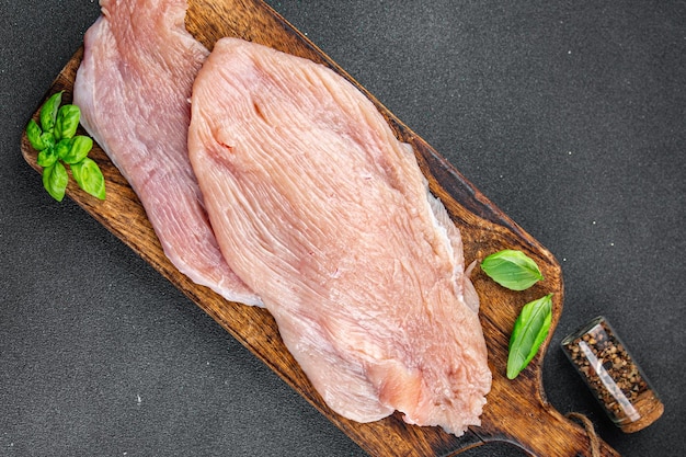 Foto filete de peru cru fatia de carne fresca de aves de capoeira alimentação saudável cozinhar aperitivo refeição comida lanche