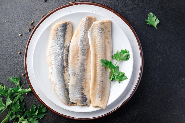 Filete de pescado arenque comida de marisco fresco snack en la mesa copia espacio comida