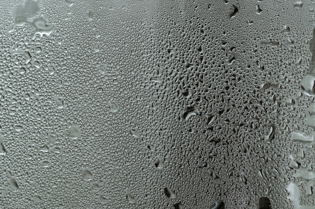 Foto fim da gota da água da textura do fundo acima.