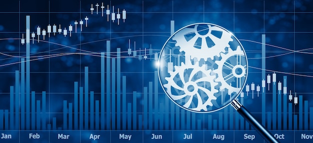 Finanzbörsenschnittstelle und Lupe mit Zahnradmechanismus