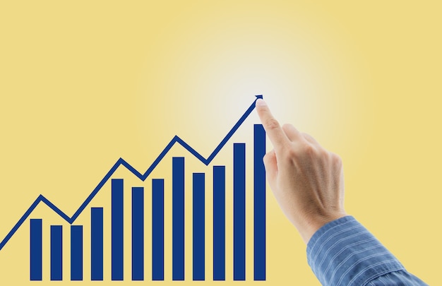 Finanzdiagramme zeigen steigende Einnahmen mit Fingerhand