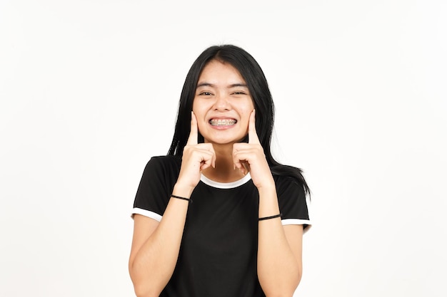 Finger auf Wange und Lächeln der schönen asiatischen Frau, Isolated On White Background