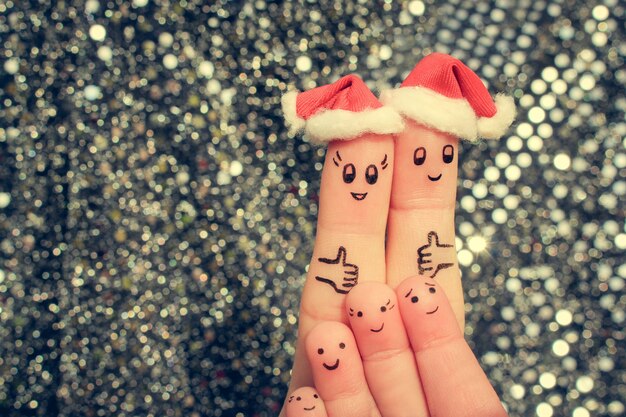 Fingerkunst der großen Familie feiert Weihnachten