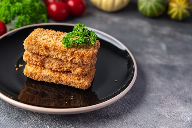 Fischstäbchen Meeresfrüchte frittierte Snack Mahlzeit Essen Snack auf dem Tisch Kopie Raum Essen Hintergrund rustikal