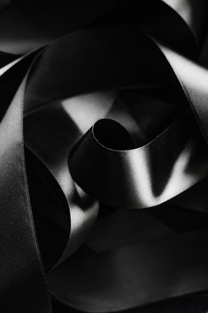 Foto fita de seda preta e branca como fundo abstrato e design de marca de luxo