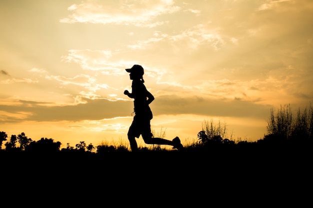 Fitness Silhouette Sonnenaufgang jogging Training Wellness-Konzept