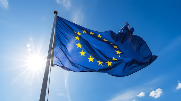 Foto flagge der europäischen union am blauen himmel und sonnenschein