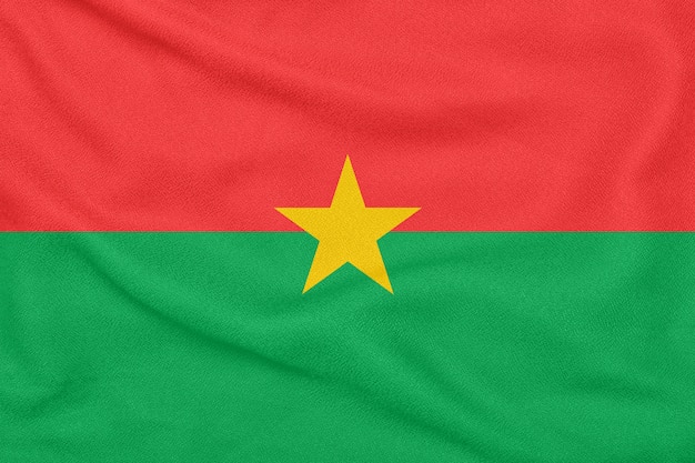 Flagge von Burkina Faso auf strukturiertem Stoff. Patriotisches Symbol