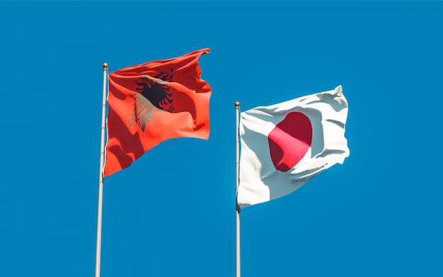 Flaggen von Japan und Albanien. 3D-Grafik