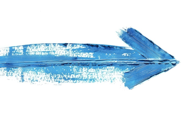 Foto flecha azul pintada a mano sobre fondo blanco con trazas de pincel